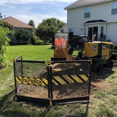 tree stump being removed